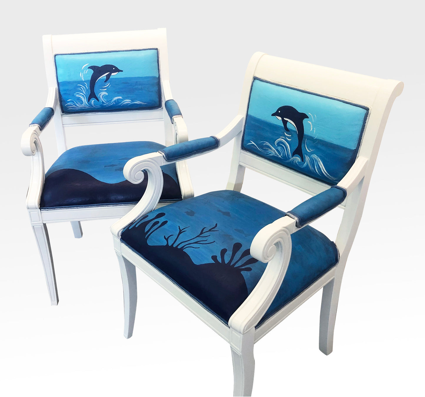 A Pair of Dolphin Chairs